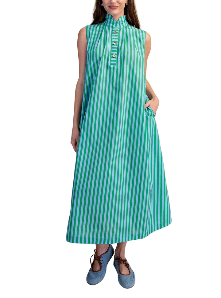 The Bess Sleeveless Striped Midi Dress combines timeless elegance with modern sophistication. Featuring a striking high collar and gleaming gold metal buttons, this piece makes an instant statement. The classic stripe pattern adds visual interest while the midi length offers versatile styling for both casual and dressy occasions. Sleeveless design keeps it light and breathable, perfect for layering or wearing solo. A wardrobe essential that transitions seamlessly from day to evening.