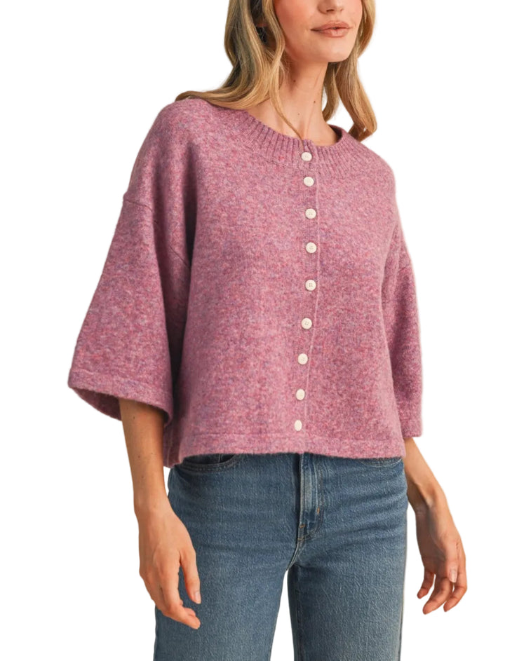 The Katie Knit Cardigan Sweater is a timeless layering essential crafted from soft, quality knit fabric. Featuring a classic button-front closure and comfortable fit, this cardigan transitions seamlessly from casual to polished looks.&amp;nbsp;