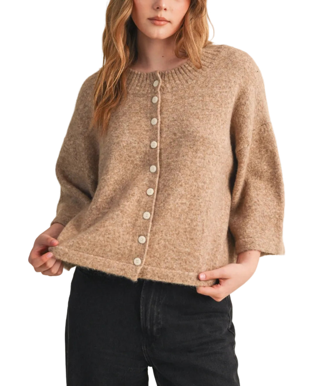 The Katie Knit Cardigan Sweater is a timeless layering essential crafted from soft, quality knit fabric. Featuring a classic button-front closure and comfortable fit, this cardigan transitions seamlessly from casual to polished looks.&amp;nbsp;