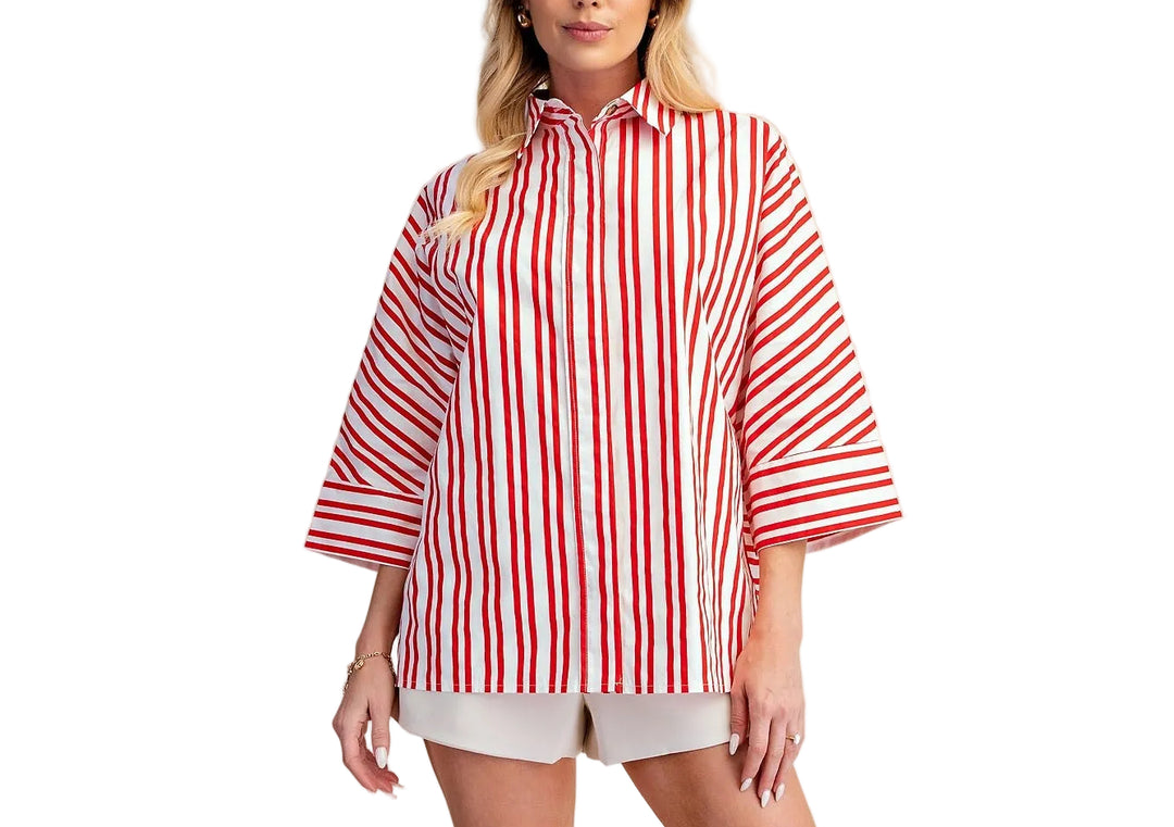 The Roxanne Oversize Stripe Shirt brings effortless style to your everyday wardrobe. Featuring bold stripes and a classic lapel collar, this relaxed-fit piece layers beautifully over basics or stands alone as a statement top. The generous cut offers comfort and movement, while the timeless stripe pattern works with virtually any outfit. Perfect for casual days, weekend outings, or dressed up with tailored pieces.