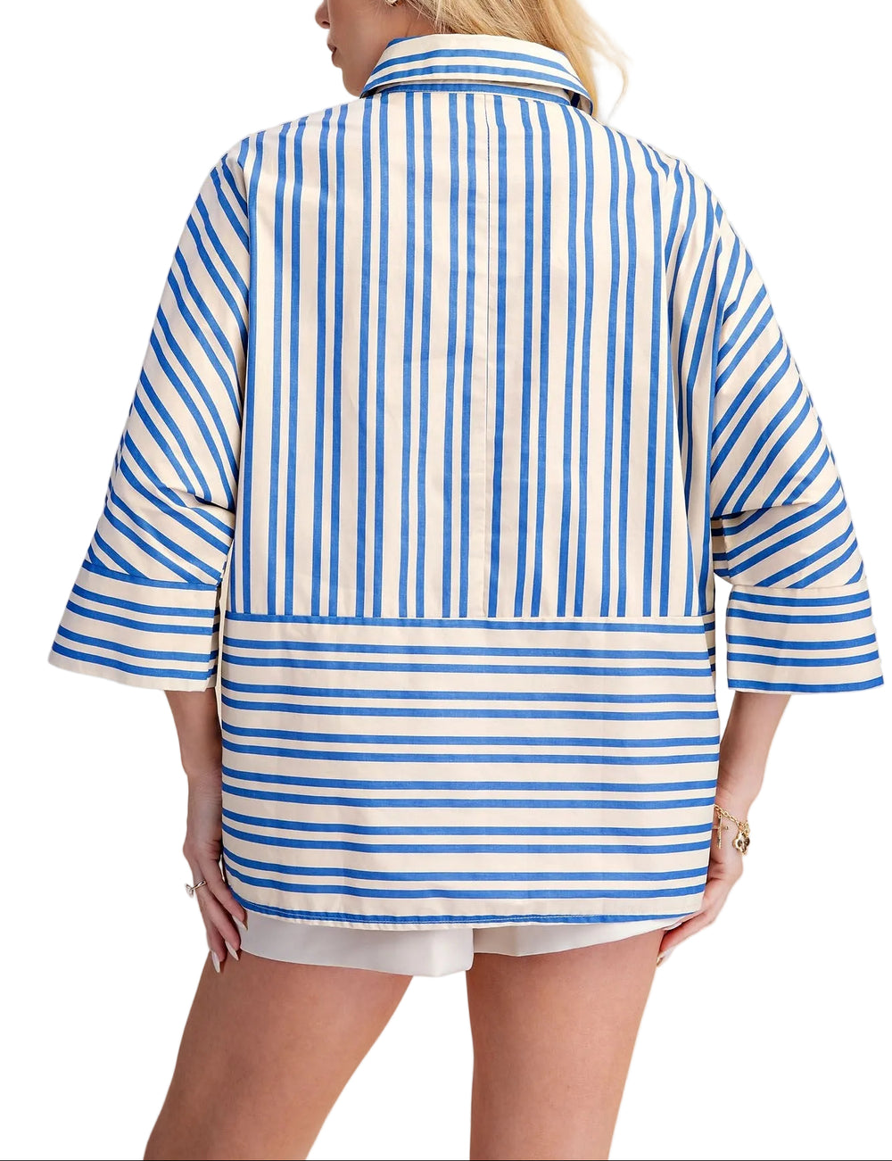 The Roxanne Oversize Stripe Shirt brings effortless style to your everyday wardrobe. Featuring bold stripes and a classic lapel collar, this relaxed-fit piece layers beautifully over basics or stands alone as a statement top. The generous cut offers comfort and movement, while the timeless stripe pattern works with virtually any outfit. Perfect for casual days, weekend outings, or dressed up with tailored pieces.