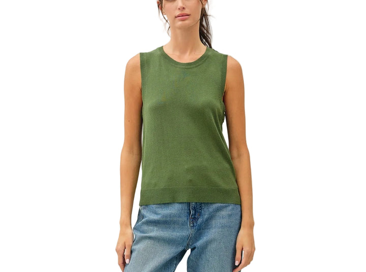 The Francis Sleeveless Sweater offers effortless layering versatility with its classic crew neck design. Perfect for transitional seasons, this piece works beautifully over collared shirts, tees, or on its own. The sleeveless silhouette provides freedom of movement while maintaining a polished, put-together look. Ideal for both casual and professional settings, it&