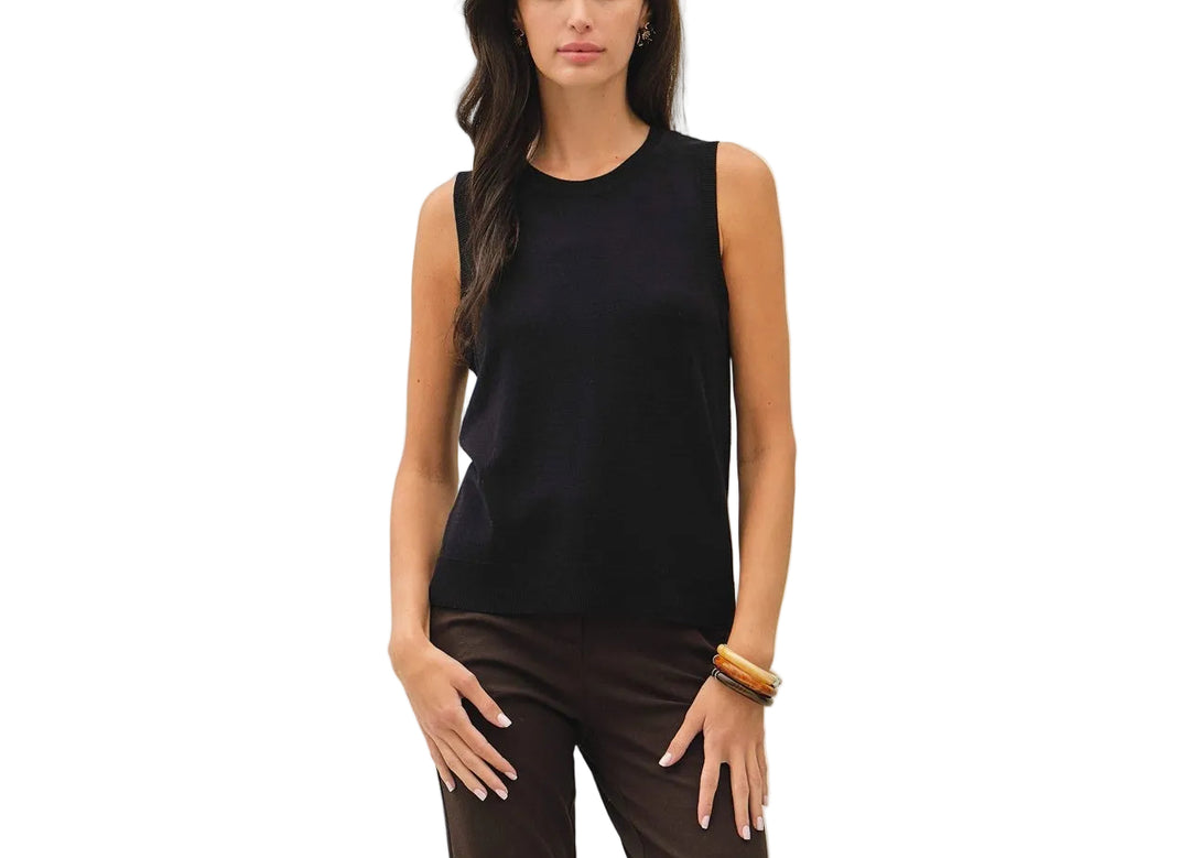 The Francis Sleeveless Sweater offers effortless layering versatility with its classic crew neck design. Perfect for transitional seasons, this piece works beautifully over collared shirts, tees, or on its own. The sleeveless silhouette provides freedom of movement while maintaining a polished, put-together look. Ideal for both casual and professional settings, it&