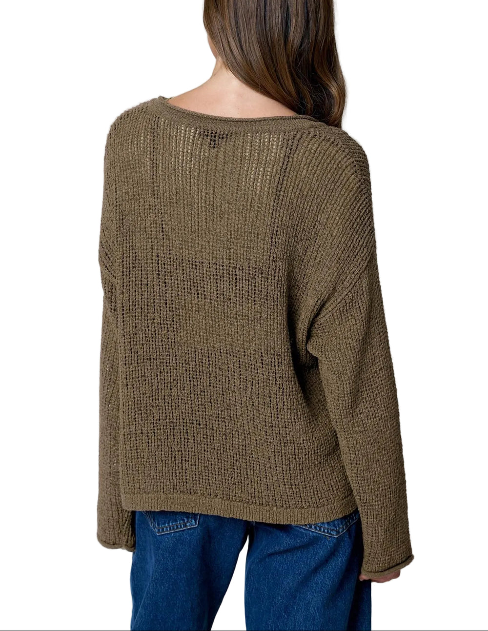 The Bev Long Sleeve Sheer Knit Sweater features a striking raw edge split neckline that adds modern edge to your everyday wardrobe. Crafted from lightweight sheer knit fabric, this sweater offers a delicate, breathable feel perfect for layering or wearing solo over a fitted tee. The long sleeves provide coverage while maintaining an airy aesthetic. Ideal for transitional seasons, this piece effortlessly elevates casual outfits with its contemporary design and soft texture.