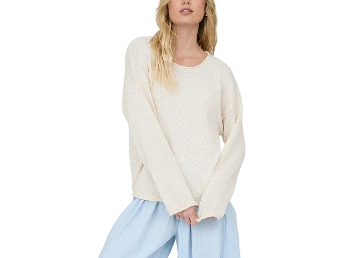 The Betsy Textured Long Sleeve Sweater features a distinctive raw edge design that adds modern appeal to a timeless wardrobe staple. Crafted with a soft, textured knit, this long sleeve sweater offers comfort and style for everyday wear. The raw edge detailing along the neckline and cuffs creates an effortlessly cool, contemporary look. Perfect for layering or wearing solo, this sweater transitions seamlessly from season to season.
