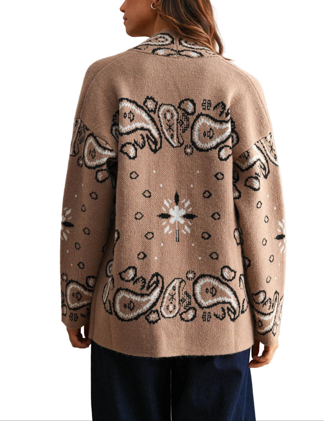 Timeless elegance meets everyday comfort in this Jackie Paisley Pattern Cardigan. Featuring an intricate paisley design, this piece layers beautifully over dresses, tees, or sweaters for effortless style. The soft, breathable fabric drapes gracefully while maintaining its shape, making it perfect for transitional seasons. Button-front closure and classic silhouette ensure versatility across your wardrobe. A sophisticated staple that works from office to weekend.