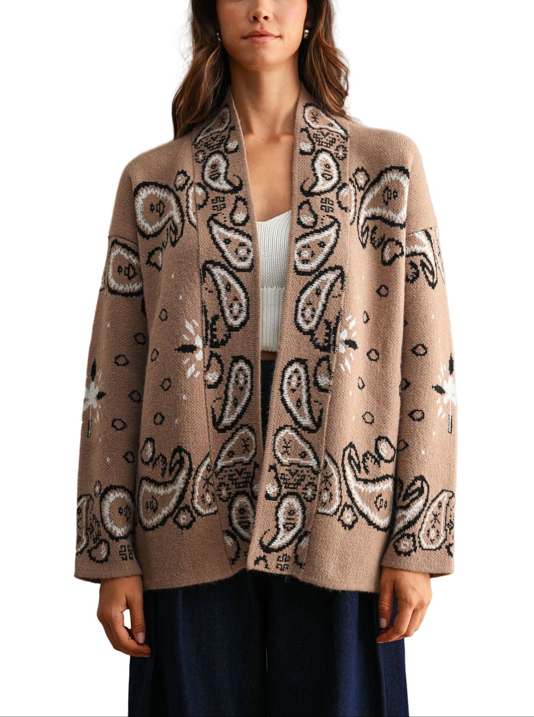 Timeless elegance meets everyday comfort in this Jackie Paisley Pattern Cardigan. Featuring an intricate paisley design, this piece layers beautifully over dresses, tees, or sweaters for effortless style. The soft, breathable fabric drapes gracefully while maintaining its shape, making it perfect for transitional seasons. Button-front closure and classic silhouette ensure versatility across your wardrobe. A sophisticated staple that works from office to weekend.