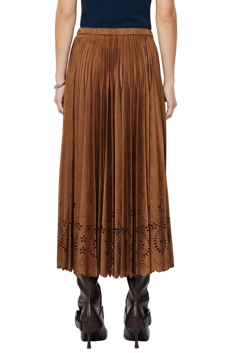 Elevate your wardrobe with the Pamela Pleated Laser Cut Midi Skirt—a modern take on timeless elegance. Precision laser-cut detailing creates striking geometric patterns that catch the light beautifully, while soft pleats add graceful movement and dimension. The midi length offers versatile styling for both casual and dressed-up occasions. Crafted for comfort and visual impact, this skirt pairs effortlessly with everything from fitted tops to oversized blouses. 