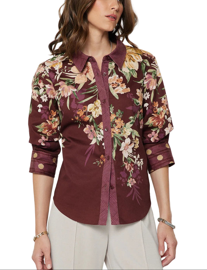 Elevate your everyday wardrobe with the Hana Floral Print Long Sleeve Top in Burgundy. This versatile piece features a delicate floral print that adds visual interest while the rich burgundy base keeps it sophisticated and easy to style. The long sleeves provide coverage and warmth, making it perfect for layering or wearing on its own. Whether you&