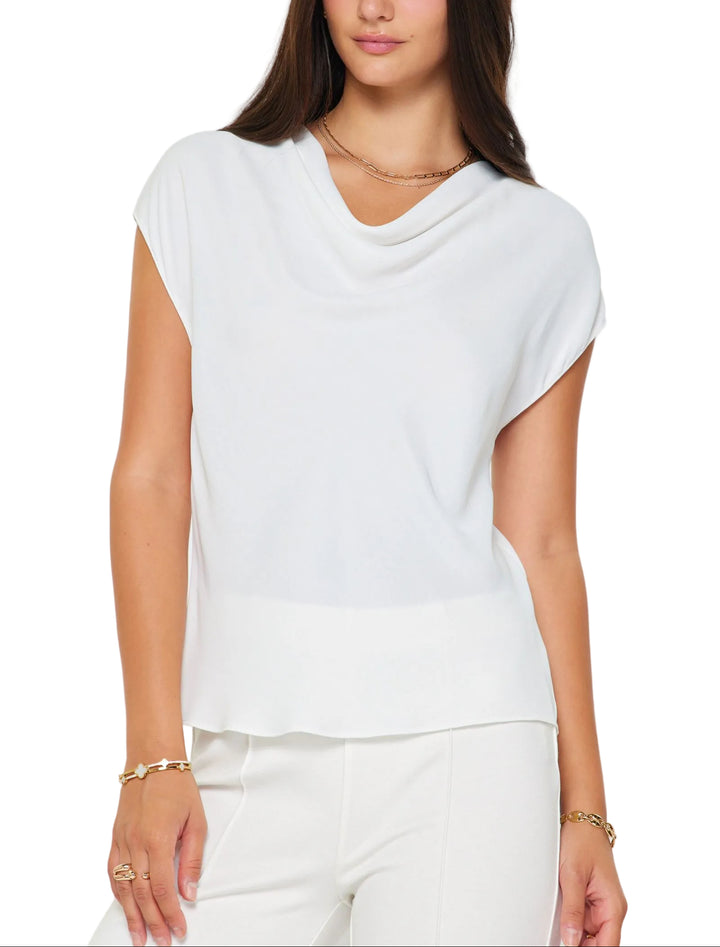 Draped cowl neck blouse
Cap sleeves
Relaxed fit
Soft drape at front neckline
Easy pullover style
Sustainable
Gentle cycle wash in cold water
100% RECYCLED POLY
