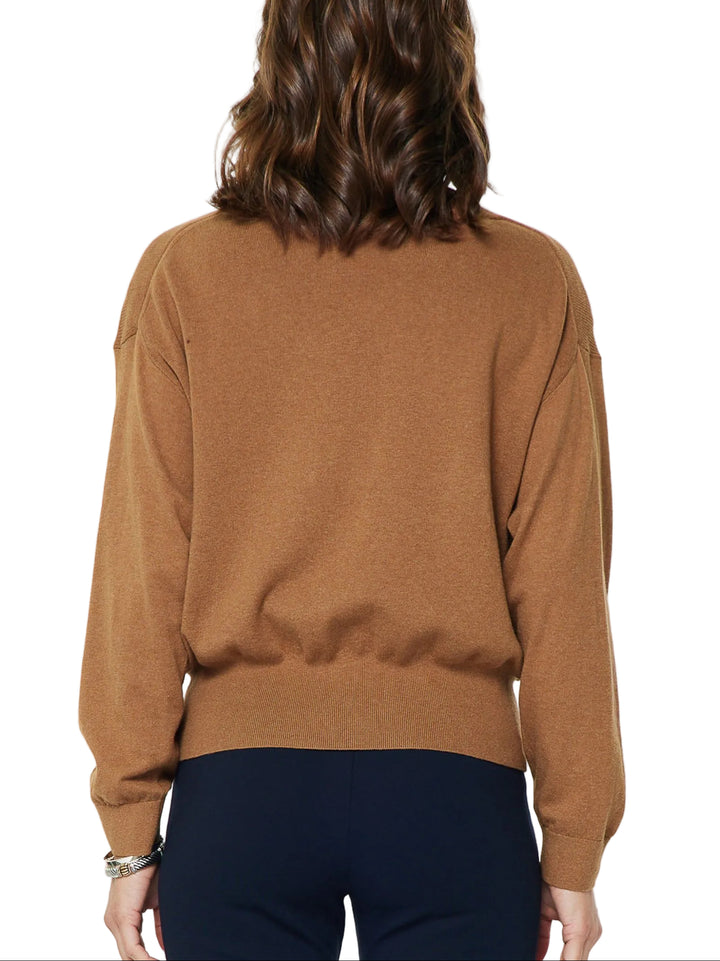 Soft fine knit fabric sweater top
Crew neckline
Twist detail front
Long dolman sleeves
Relaxed fit