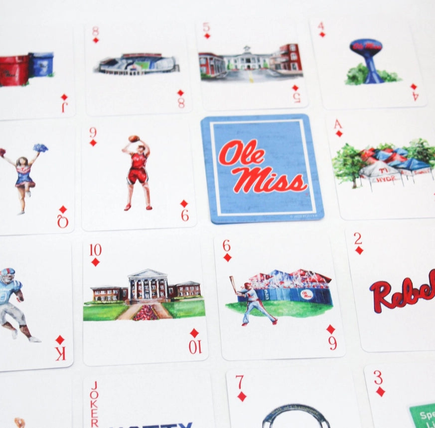 Painting of iconic University of Mississippi locations, traditions, and events! The FOSTER collegiate line is meant to foster a collection of memories of our community’s alma maters!

The officially licensed playing cards send a portion of proceeds back to Ole Miss to contribute to scholarship fundings.

 * Standard, Poker Size Playing Cards 
 * 52 card deck, plus 2 jokers 
 * 16 paintings in each deck 
 * Original artworks by FOSTER 
 * Officially licensed by the CLC 


These Ole Miss Playing Cards are a g