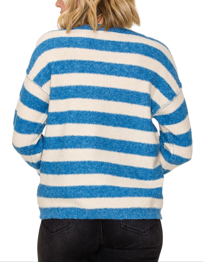 Wrap yourself in cozy charm with the Shannon Striped Crew Neck Sweater. Its playful stripes and classic crew neck make it the perfect pick for brightening up chilly days. Soft and comfortable, this sweater pairs effortlessly with your favorite jeans or skirts for a fun, laid-back look. Get ready to turn heads and stay snug all season long!
