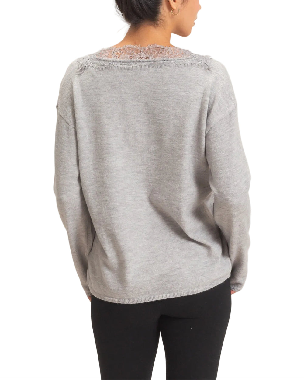 Elevate your everyday wardrobe with the Linda Lace Trim V-Neck Sweater. This refined piece features delicate lace detailing along the neckline, adding a touch of elegance to a timeless silhouette. The flattering V-neck design creates a lengthening effect, while the soft, quality knit provides all-day comfort. Perfect for layering or wearing solo, this versatile sweater transitions seamlessly from office to weekend. A wardrobe essential that pairs effortlessly with jeans, trousers, or skirts for countless st