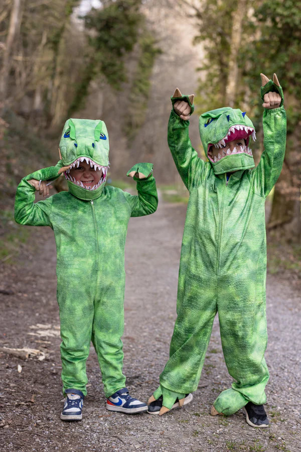 Get ready for dino-sized adventures with the A Land Before Mine Deluxe T-Rex! Designed for the fiercest of little explorers, this light green one-piece costume is packed with prehistoric power. The front zipper makes it easy to suit up and step into the role of the king of dinosaurs.

A dramatic tail cascades down the back, featuring bold metallic green spikes for extra stomp-worthy style. The plush T-Rex head fits comfortably over yours, with stuffed details like big eyes and ferocious teeth to bring your 