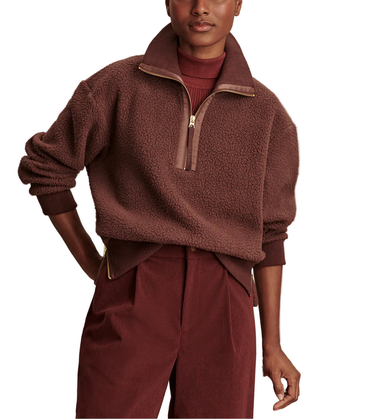 Designed for cool weather layering, the Roselle is a relaxed yet refined half-zip fleece.
