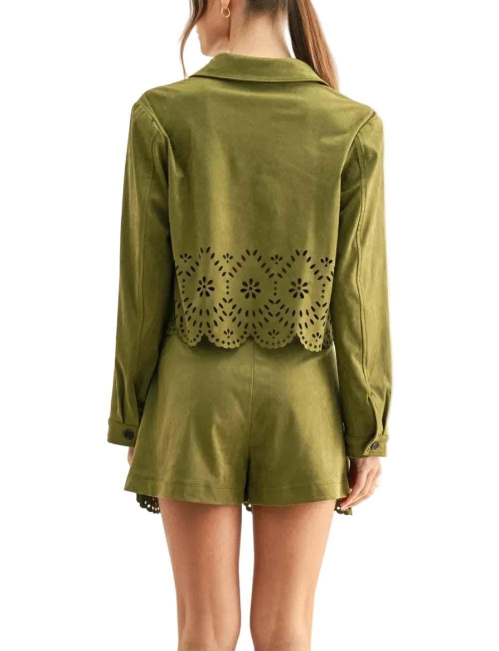 A woman shown from the back wearing an olive green long-sleeve top and matching shorts with a decorative eyelet lace panel across the lower back, against a plain light background.