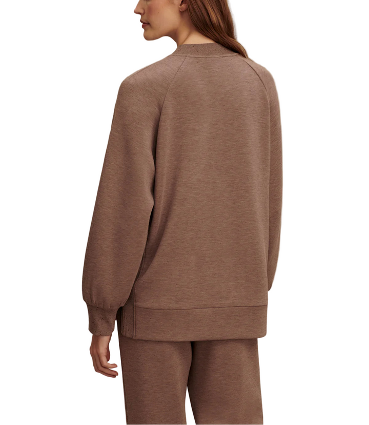  This sweatshirt offers an oversized, boyfriend-style fit, inspired by our popular Mae design. Featuring long side zips with rib inserts, a classic crew neck, and a deep hem, it's perfect for easy-going days paired with sweatpants or leggings.