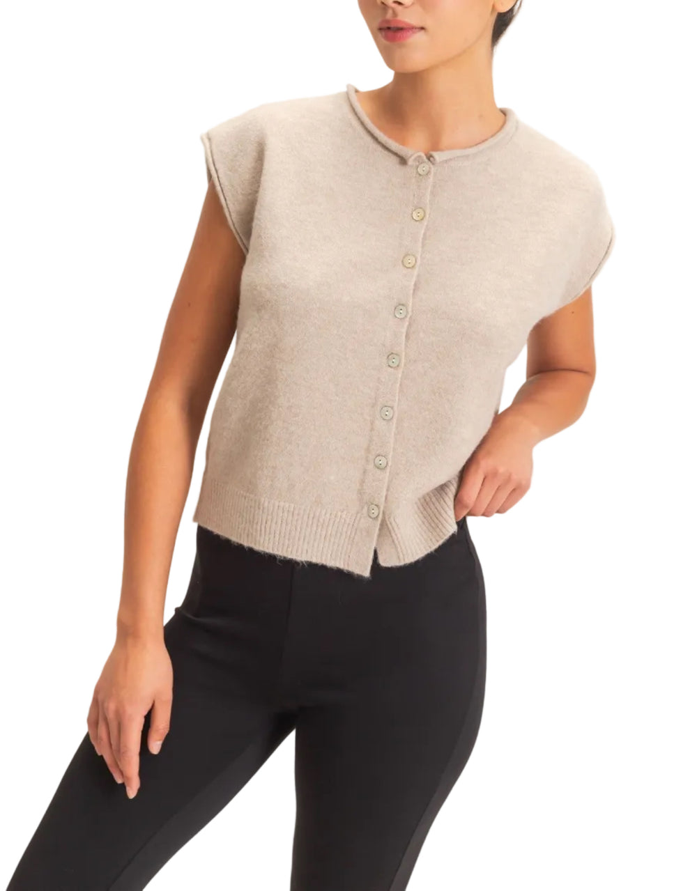 This sleeveless button front sweater vest features a classic rolled crew neckline and a relaxed silhouette, perfect for layering. Crafted with precision, it offers an elevated look with its ribbed hem. Pair it with high-waisted denim and a statement belt for a chic ensemble.
