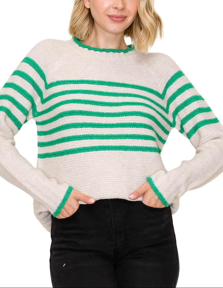 Bring a pop of fun to your wardrobe with the Polly Striped Sweater! This cozy crew neck features cheerful stripes that brighten any day while keeping you snug. Perfect for layering or wearing solo, it’s the playful twist your outfit has been waiting for.