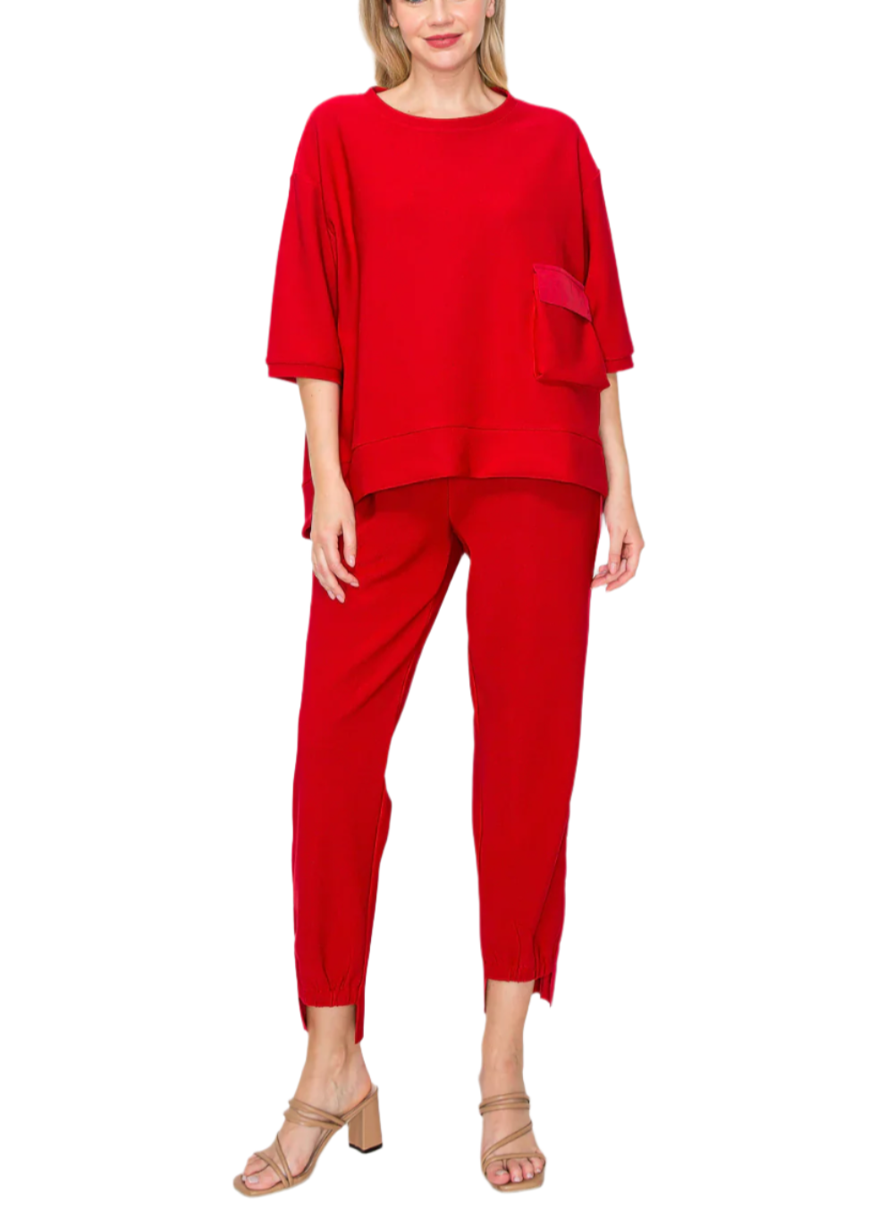 The Karen top. Made with high quality knit crepe. Oversized relax fit. Round neck, elbow length sleeves and front pocket.

The Katie pant. Made with high quality crepe knit. Elastic waist for the perfect fit. Side pockets and side contrasts. Bottom high-low with details. Easy relax fit. 
