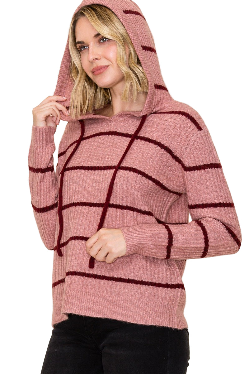 Stay cozy and cute in the Rachel Striped Hoodie Sweater. Its playful stripes and adjustable drawstring neck add a fun twist to your casual look while keeping you warm. Perfect for laid-back days or layering up for chilly adventures.