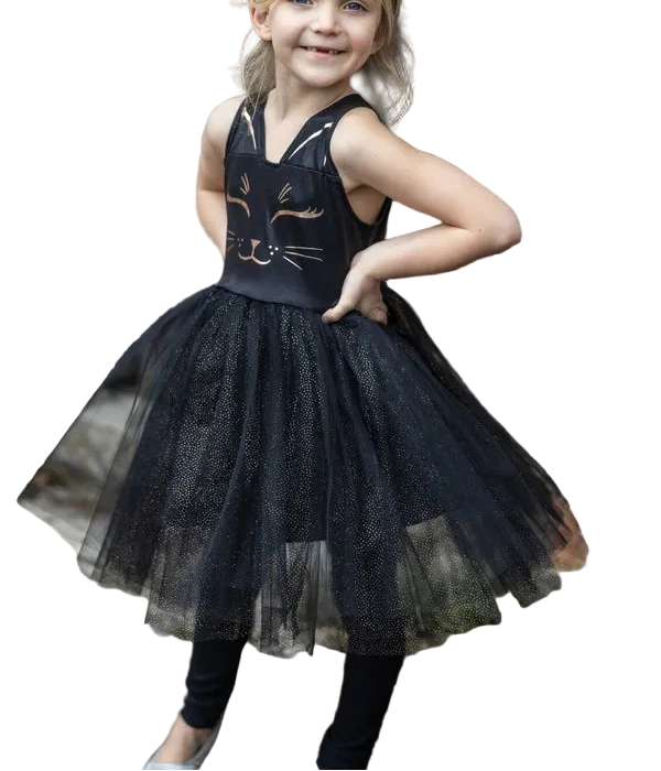 Our new Black Cat Dress &amp; Headband is the purrfect ensemble for your little feline aficionado! The dress features a sleek black design adorned with a charming cat face printed in shimmering rose gold on the chest. Its skirt dazzles with golden heat-sealed sparkles, adding a touch of glamour to every twirl. And what&