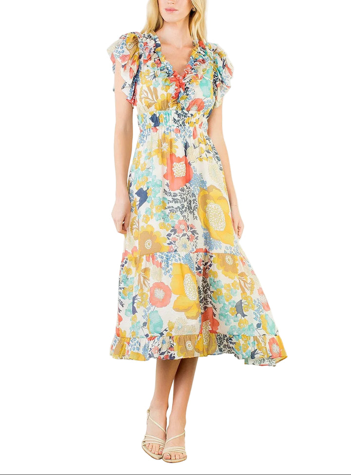 Effortless elegance meets romantic style with the Caroline Floral Pattern Midi Dress. Delicate flutter sleeves add a playful touch while tiered layers create flattering movement and dimension. The charming floral print brings springtime freshness to any occasion, from garden parties to casual outings. Perfect for those seeking a versatile piece that transitions seamlessly from day to evening wear.