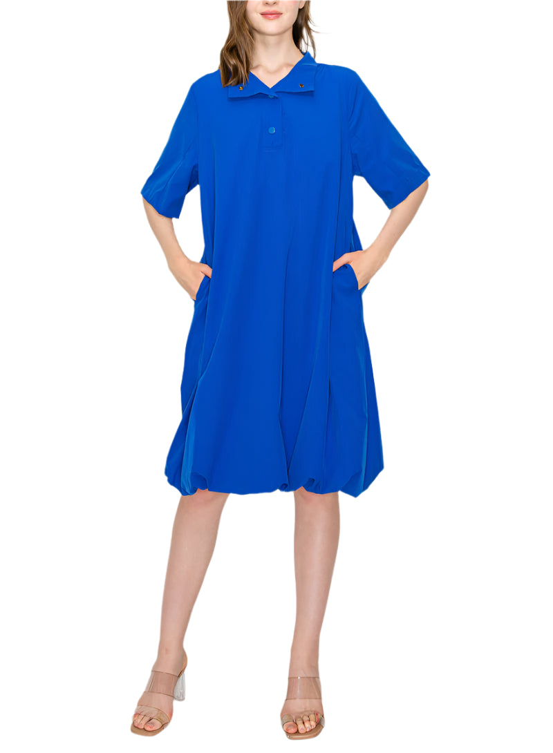 The Joella Woven Dress. Chic comfortable knee length dress made with high quality woven stretch parachute. Half sleeve. Bubble hem. Collar. Can be button up to top to create turtleneck style. Easy relax fit. Stylist and comfort