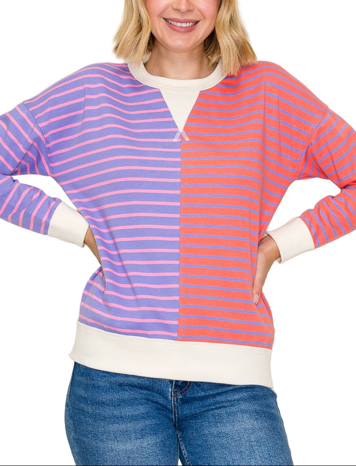 Stay cozy and stylish in the Demelaz color trimmed stripe sweatshirt. With vibrant stripes adding a fun pop of color, this playful sweatshirt brings a fresh twist to your casual wardrobe. Perfect for layering or lounging, its comfortable fit keeps you warm while showcasing your bold, cheerful side. Embrace effortless cool and brighten your day with this lively essential.