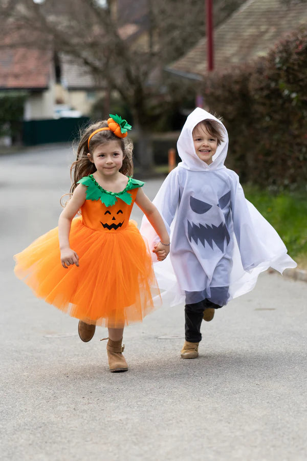Boo-tifully simple and hauntingly fun, our NEW&amp;nbsp;Spooky Ghost Poncho is the perfect costume for little ghouls who love to keep things comfy&amp;nbsp;and&amp;nbsp;creepy! Made from soft white fabric, this poncho features a classic ghost face design with bold black eyes and a mouth, plus a roomy hood for an extra eerie effect.&amp;nbsp;The fabric flows and drapes just like a real ghost, creating a playful, floating silhouette that&
