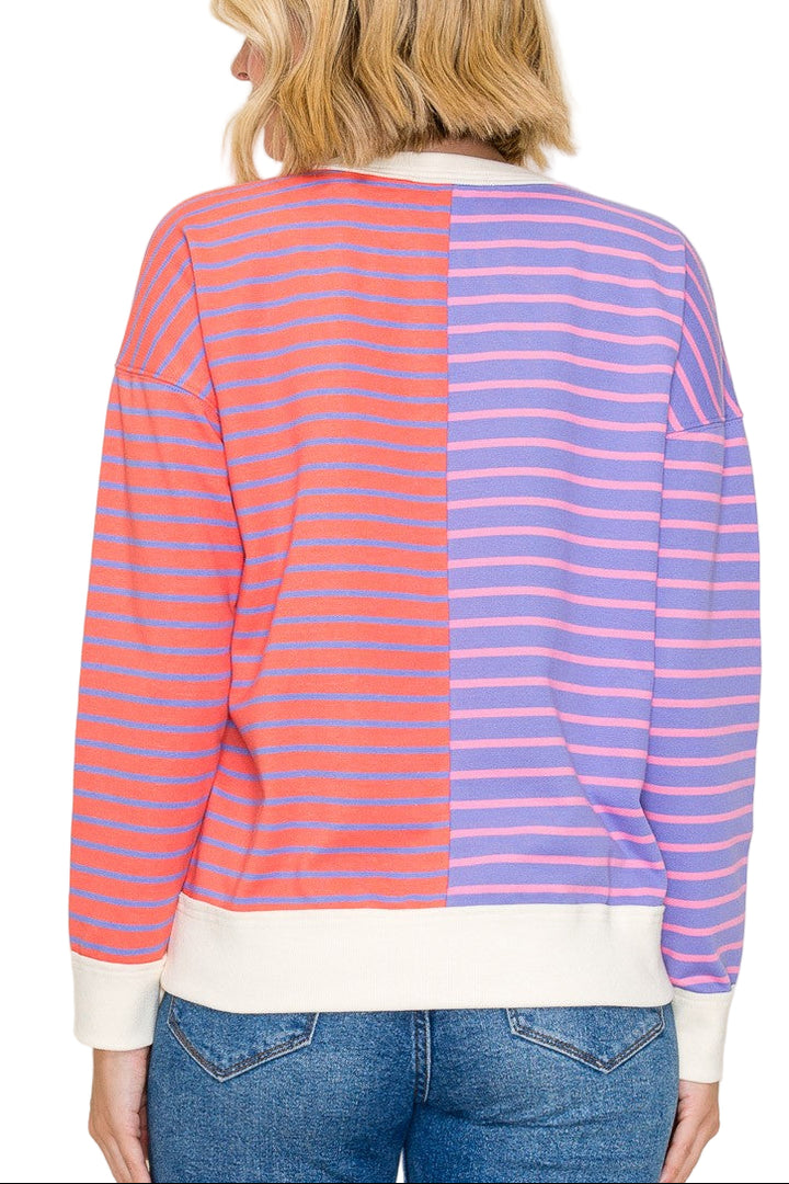 Stay cozy and stylish in the Demelaz color trimmed stripe sweatshirt. With vibrant stripes adding a fun pop of color, this playful sweatshirt brings a fresh twist to your casual wardrobe. Perfect for layering or lounging, its comfortable fit keeps you warm while showcasing your bold, cheerful side. Embrace effortless cool and brighten your day with this lively essential.