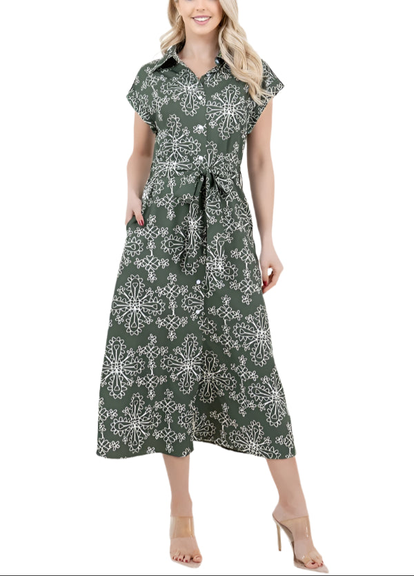 Step into sunshine with the Meghan Floral Print Midi Dress in Green. This playful dress features a lively floral pattern that brings a fresh, cheerful vibe to your wardrobe. Its flattering midi length offers a perfect balance of comfort and style, making it ideal for garden parties, brunch dates, or casual strolls.