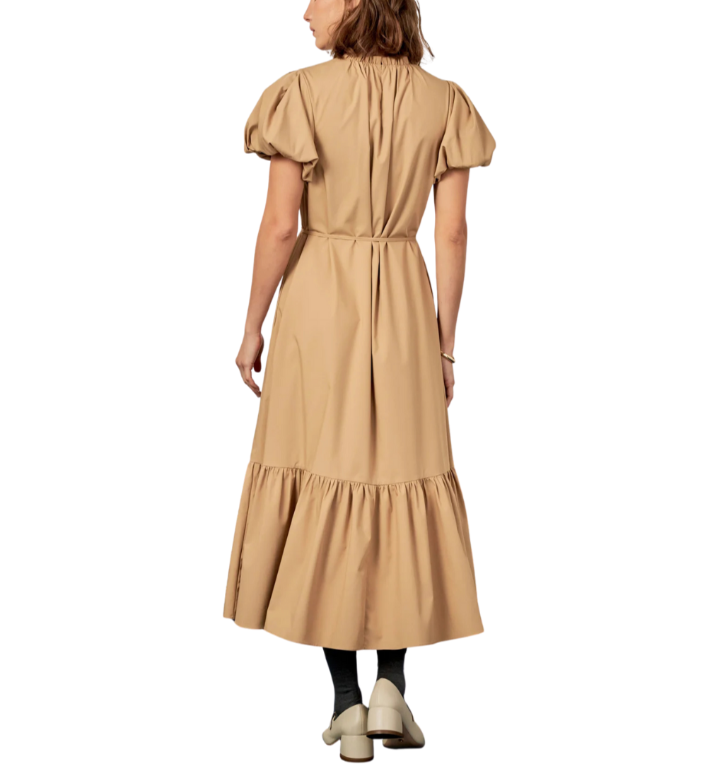 Introducing our Skinny Belted Midi Dress the perfect addition to your wardrobe. Designed with a flattering midi length this dress is both trendy and versatile. Featuring convenient side seam pockets you can keep your essentials close at hand. The elegant neck ruffle detail adds a touch of sophistication while the back button closure with keyhole completes the look. Ideal for any occasion this dress is a must-have for any fashion-forward woman. Shop now and upgrade your style game effortlessly.