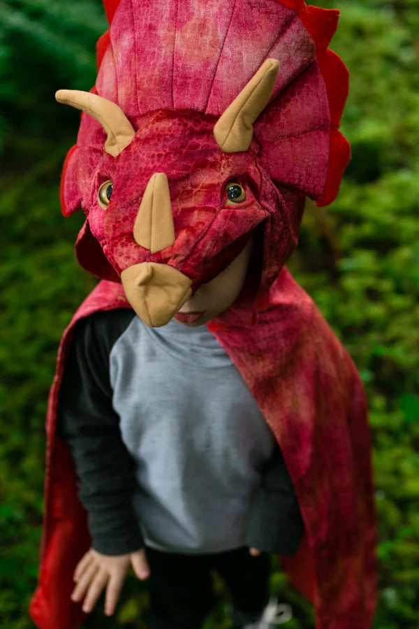 Dinosaurs that are Jurassic! This dino cape from our Dino Collection, features textured velour, realistic eyes, and 3D stuffed detailing. Horns and felt detailing around the head makes this Triceratops dino something to roar about! A lined hood and Velcro closure makes this cape durable and always machine washable. 