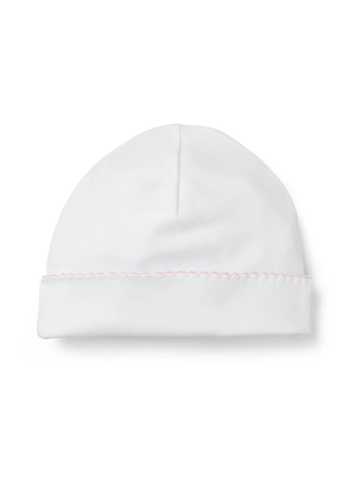 Soft, simple, and perfect for baby’s first days, the cotton Saylor beanie is thoughtfully designed for newborn comfort. Made from gentle organic cotton, it features a classic fold-over cuff with delicate picot trim for a sweet finishing touch. Cozy, breathable, and easy to wear, it’s an everyday essential that pairs beautifully with any Paty newborn outfit.