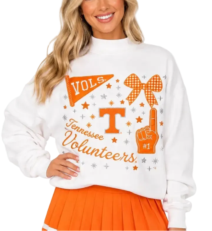 * Officially Licensed Collegiate Product with the University of Tennessee 
 * Mock neck silhouette with varsity patch team logo collage 
 * Crafted from soft cotton terry material — 80% Cotton, 20% Polyester 
 * Relaxed, oversized fit — easy to style for game day or everyday wear 