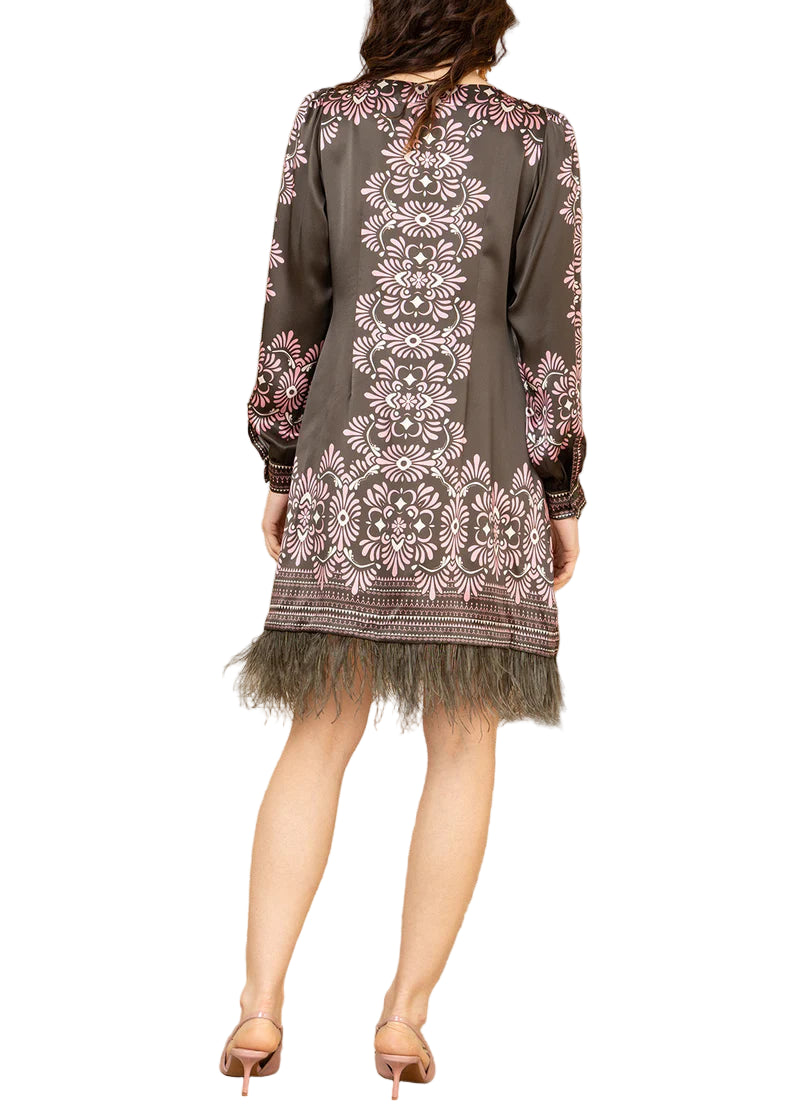 Washed charmeuse
Slim, easy body
Long sleeve with cuff
Pockets at hips
Feather trim at hem (removable)
Above the knee length (35.5” HPS)