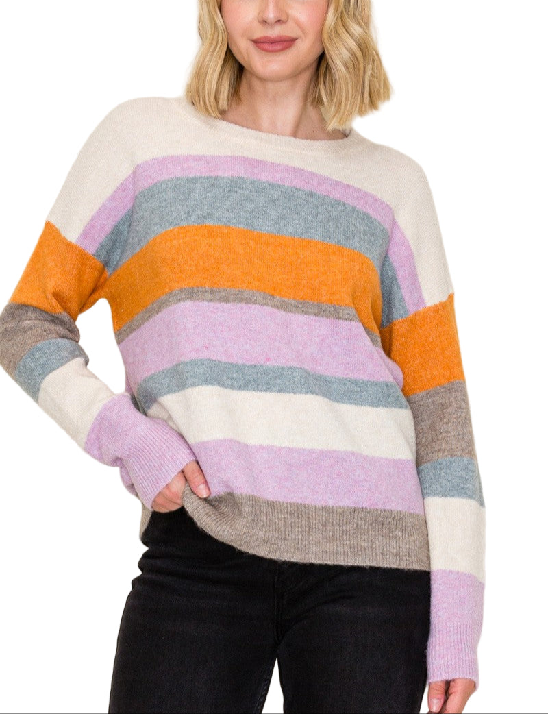Add a splash of fun to your wardrobe with the Connie Multi Color Sweater. This cozy crew neck combines vibrant hues for a playful look that brightens up any outfit. Perfect for chilly days, it keeps you comfy while adding a cheerful twist to your style.