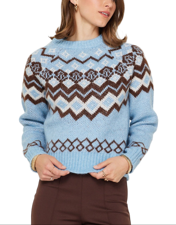 Cozy up in timeless style with the Lane Fair Isle Sweater, featuring a charming geometric pattern in soothing smoke blue tones. This classic knit blends traditional fair isle craftsmanship with modern comfort, making it perfect for layering through crisp autumn days or standing solo when temperatures drop. The intricate multi-color design adds visual interest to any outfit, while the soft, breathable fabric keeps you feeling great all day long.