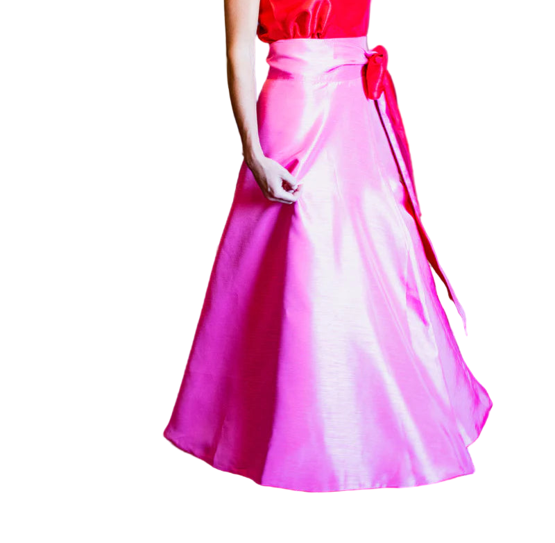 Meet our Perry Reversible Skirt. 
This vintage pink and ruby red reversible ball skirt is a statement in class and elegance.  The perfect staple to add to your wardrobe. 

Twirl into your next event in the most fabulous in this versatile piece that pairs perfectly with a simple white button down and beyond.  

With its wrap design and full length skirt, it is a nice adjustable fit that ties in the perfect bow at the waist.

Made of a beautiful poly shantung.

Handmade in the USA.

Poly blend shantung fabric