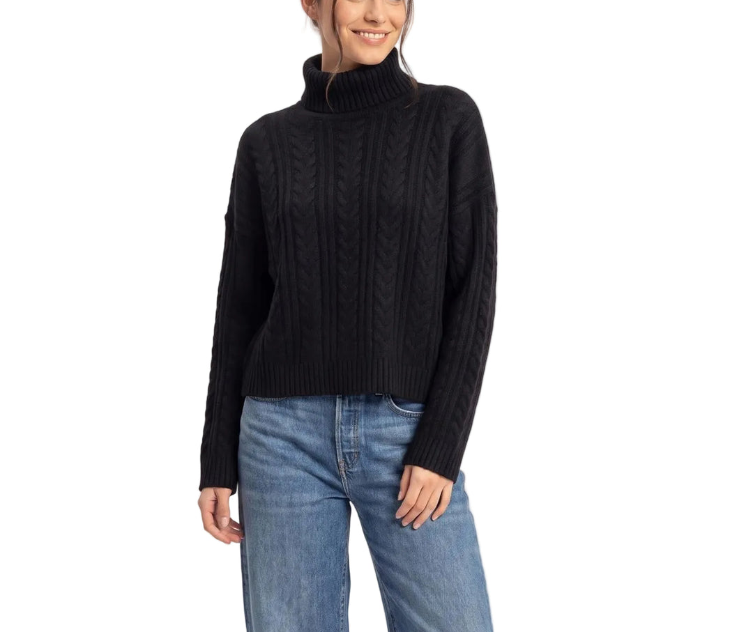 Effortless sophistication meets timeless comfort in the Marisa Cable Knit Turtleneck Sweater. This classic piece features a chunky cable knit texture that adds visual interest and warmth, perfect for layering or wearing solo. The fitted turtleneck and ribbed cuffs provide a polished silhouette, while the soft knit fabric drapes beautifully against the skin. Ideal for cooler seasons, this versatile sweater pairs seamlessly with jeans, trousers, or skirts for an elevated everyday look.