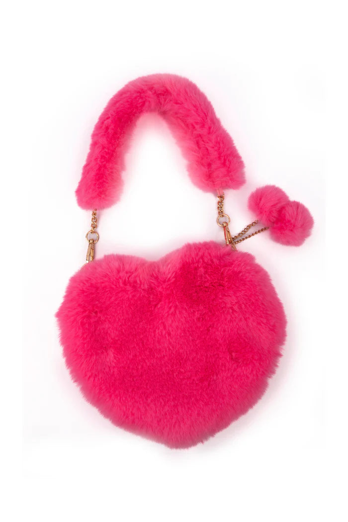 Soft and fluffy, this heart shaped purse is perfect for carrying small treasures while making a bold fashion statement. The heart shape and plush fur design make it a playful and stylish addition to any outfit, ideal for dress-up, playdates, or everyday adventures