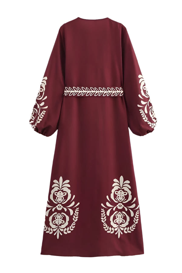 Step out in style with the Mia Long Dress in Burgundy. This playful piece features a flattering V-neck and long sleeves, perfect for any season. The button-down front adds a charming touch, making it easy to dress up or down.