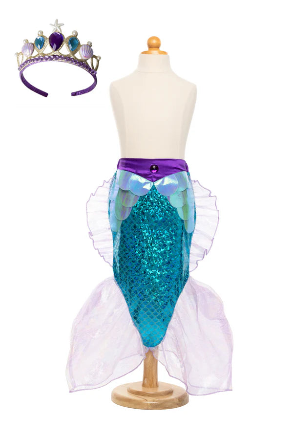 Mermaid Glimmer Skirt with Tiara is a magnificent 2-pc Set! The gorgeous mermaid skirt has extra fabric gathering and a wide elastic on the backside for added comfort and extra size flexibility. This skirt features holographic dimensional scales which make it shimmer and shine with every turn. With its iridescent foil print and shimmery soft tulle fins, this skirt is a real gem, and yes, it is machine washable! The tiara is comfortable and flexible with a bit of bend to it. The band is covered in soft fabri