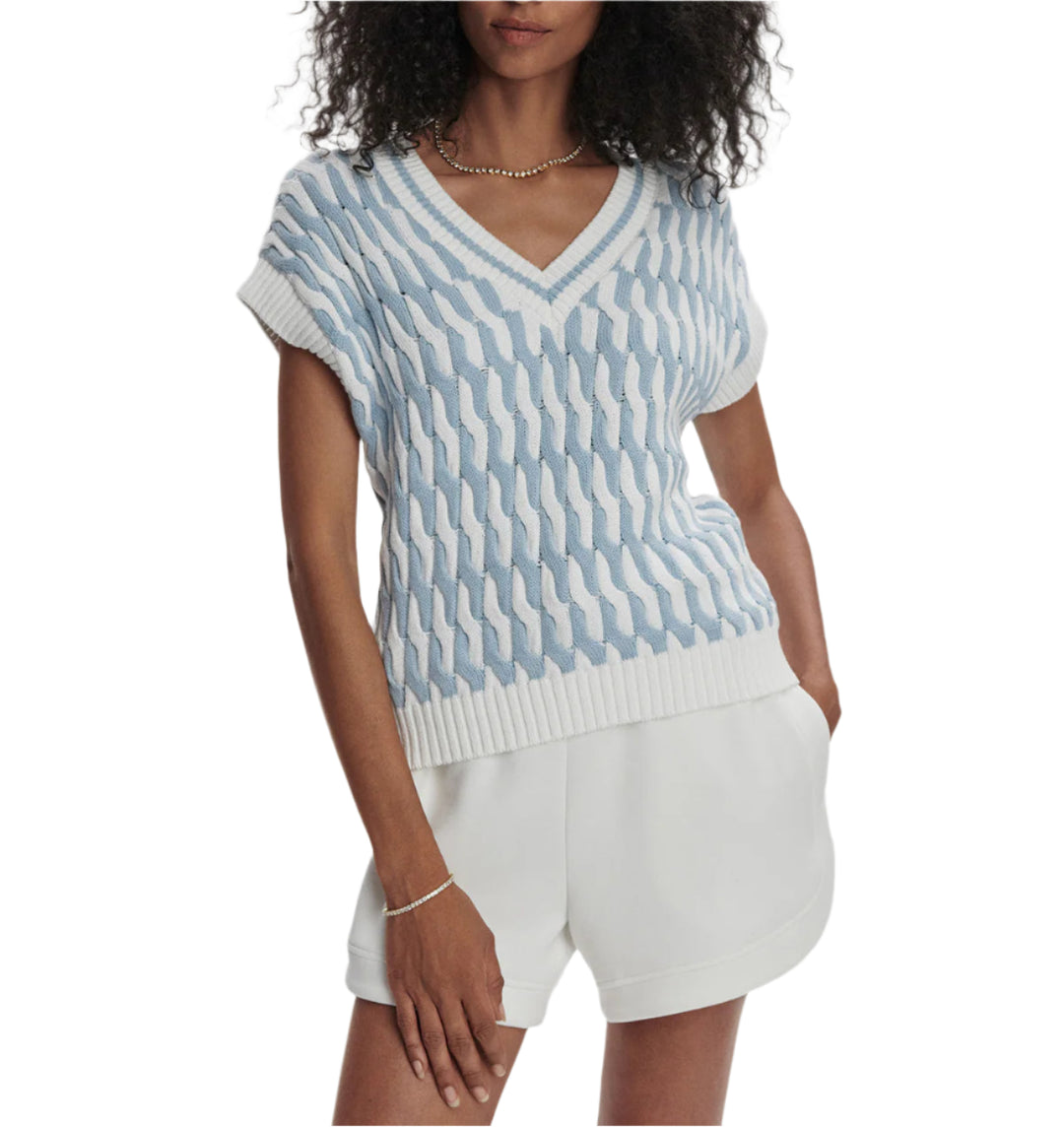 This chunky knit vest is made from 100% cotton in a relaxed fit and features a bold two-tone design. Wear it on its own or layered with t-shirts and dresses in the transitional months.