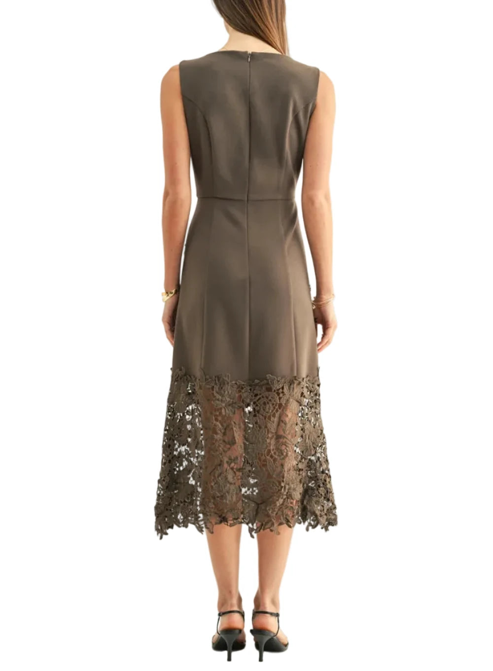 Cut from a smooth, mid-weight woven fabrication in a deep, sophisticated Espresso colorway, the garment boasts a clean, sleeveless design paired with a classic boat neckline. The structured bodice features princess seams that contour the figure down to a natural waistline before flowing into a chic column midi dress. The lower dress is finished with a subtly ruffled, scalloped lace edge that adds fluid movement.