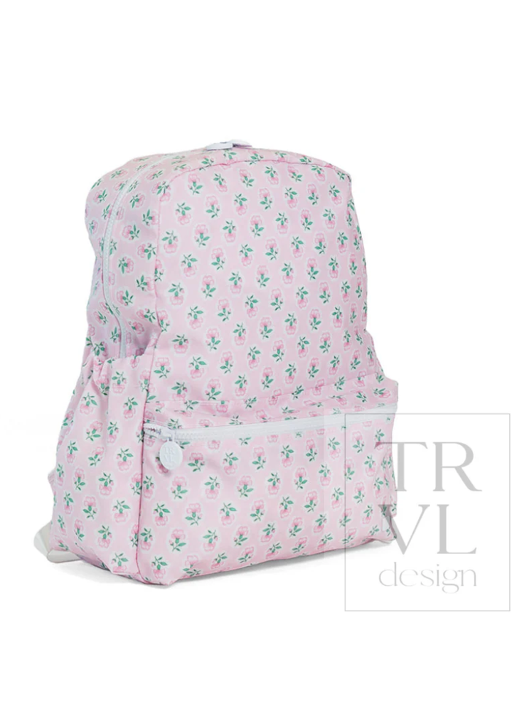 Pink floral-patterned backpack on a white background