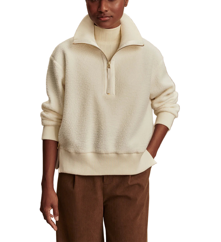 Designed for cool weather layering, the Roselle is a relaxed yet refined half-zip fleece.