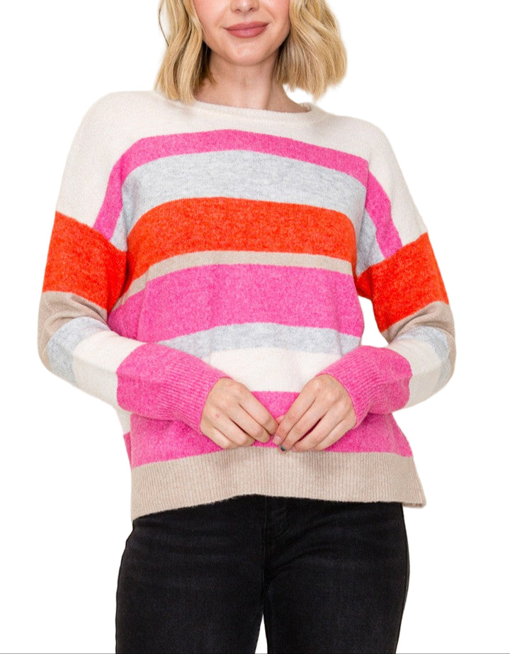 Add a splash of fun to your wardrobe with the Connie Multi Color Sweater. This cozy crew neck combines vibrant hues for a playful look that brightens up any outfit. Perfect for chilly days, it keeps you comfy while adding a cheerful twist to your style.